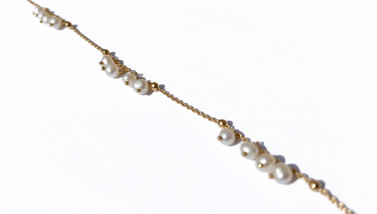 Geboortesteen armbandje met 4 parel paren