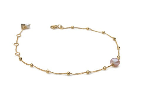 Zilveren Juno armband met een grote opvallende roze zoetwaterparel, van Néhlia.