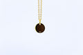 Achterkant goldplated zilveren Isla herinneringsketting met graveerbare coin.